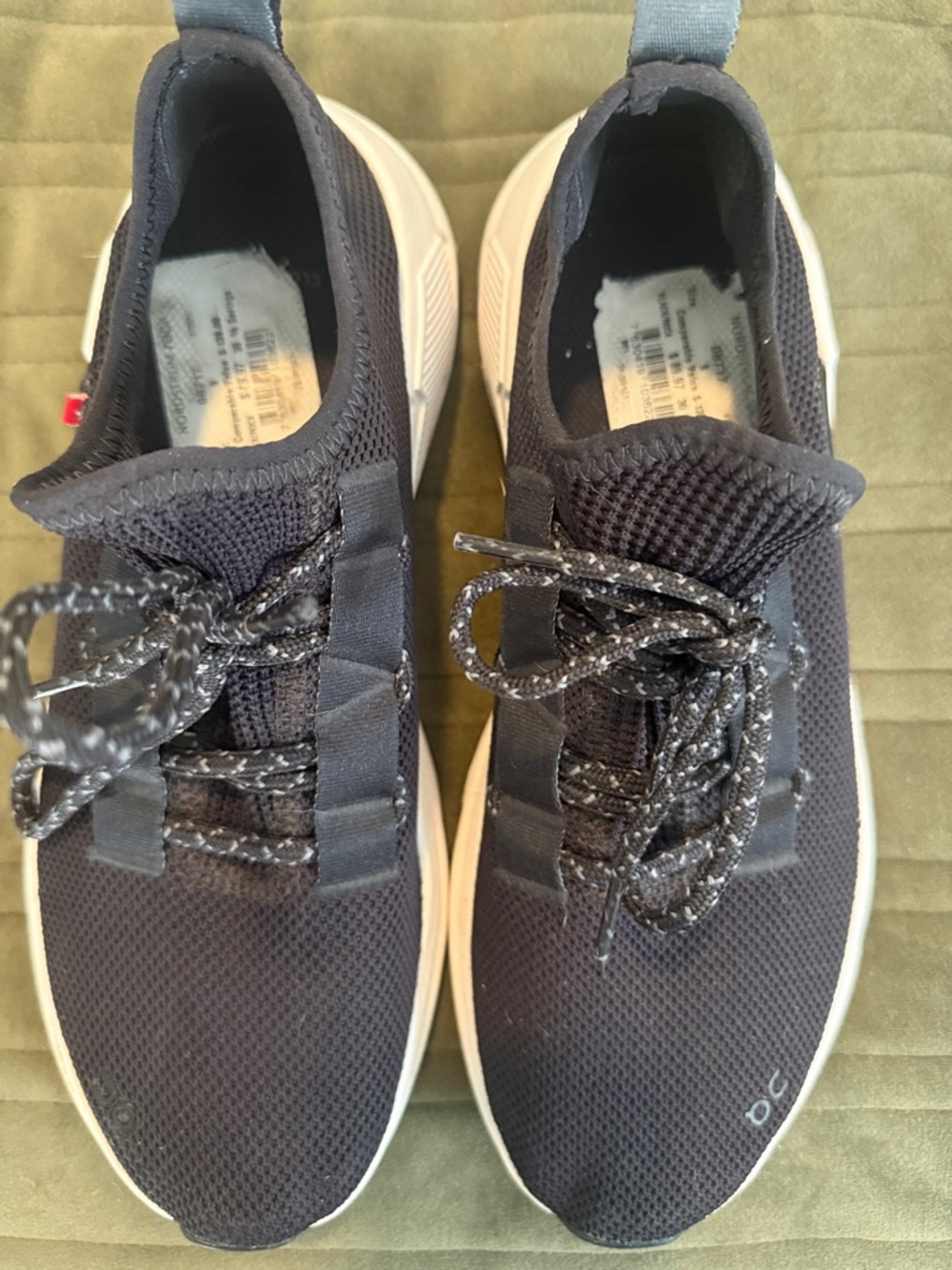 On Running Women’s Knit Lace-Up Sneakers in Black and White
